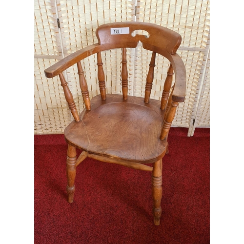 162 - Heavy solid bow back smokers chair 81x60x47 cm