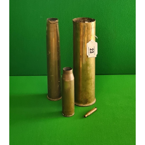 23 - 4 brass artillery shells