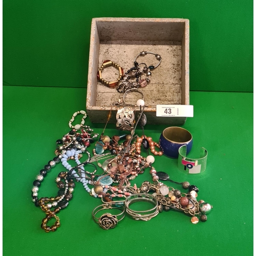 43 - Box of costume Jewellery