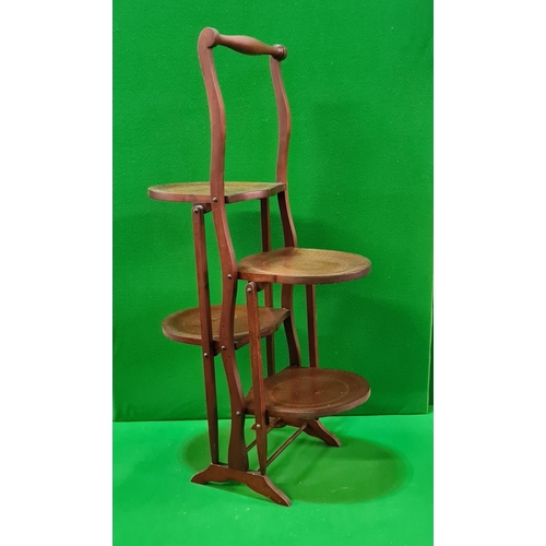 98 - Folding mahogany cake stand measuring approx. 40x26x77 cm