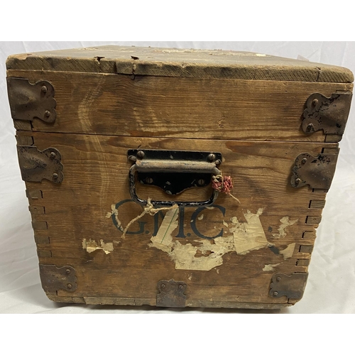 16 - Well travelled wooden trunk having original destination labels