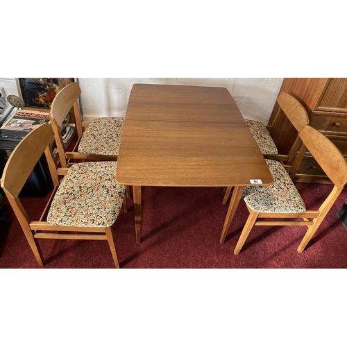 107 - Mid century extending dining table and 4 chairs