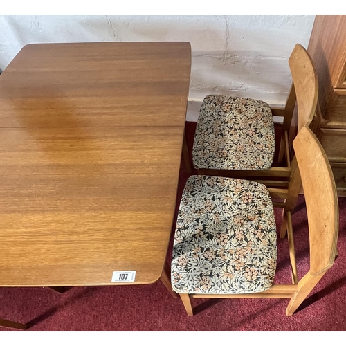 107 - Mid century extending dining table and 4 chairs