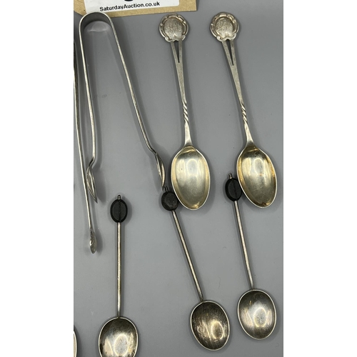 5 - Silver items: 2 sugar nips and 8 tea spoons weighing 120g. UK and Worldwide shipping available on th... 
