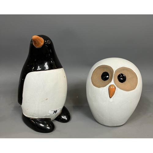 70 - 2 glazed earthenware garden ornaments in the form of an Owl and a Penguin