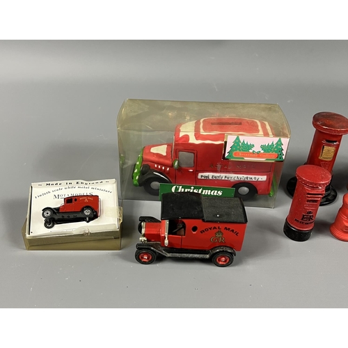 14 - Royal Mail themed collectables including money boxes and model vehicles. Shipping group (A)