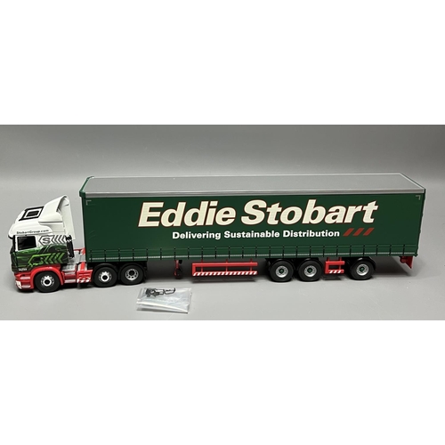 15 - 2 Corgi model trucks, one being a Scania R (Facelift) with Eddie Stobart livery. Shipping Group (A).