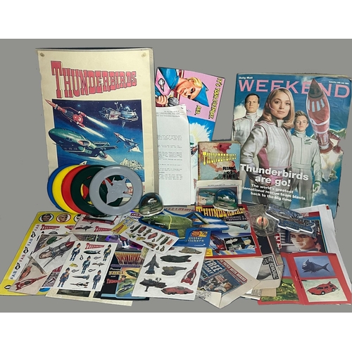 51 - Large collection of Thunderbirds ephemera and accessories. Shipping Group (A).