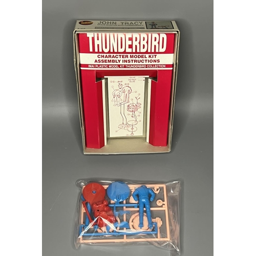 56 - Imai Thunderbirds John Tracy figure model kit (unbuilt). Shipping Group (A).