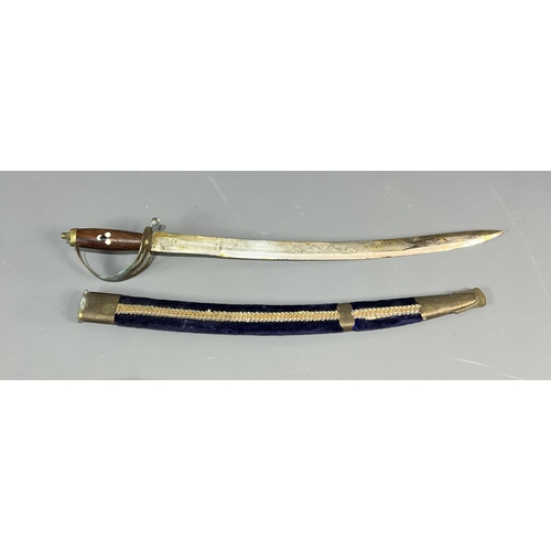 12 - Indian origin ceremonial sword with scabbard. 60cm in length. Shipping Group (A).