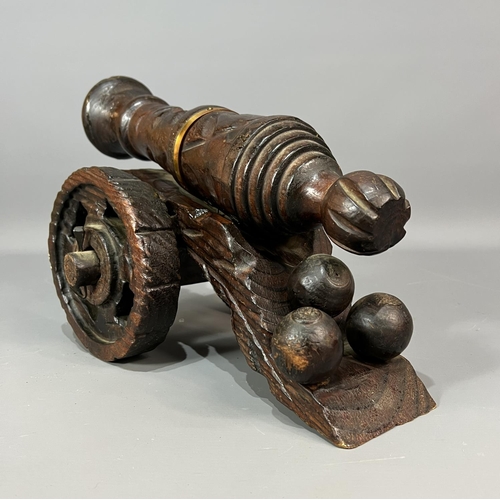 31 - Large wooden carved cannon 30x50cm. Shipping Group (A).