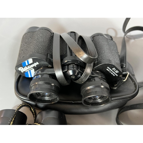 61 - 5 pairs of binoculars including Steiner, Pathescope 16x50, Nikon 9x25. Shipping Group (A).