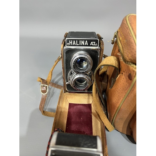 86 - Selection of vintage cameras including Prakica, Halina, etc.,  Shipping Group (A).