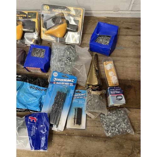 161 - Assortment of hardware fixings, drill bits and  accessories. Collection only or please arrange your ... 