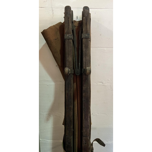 200 - Full size antique St. Johns Ambulance stretcher. Constructed of solid oak and canvass having pull-ou... 