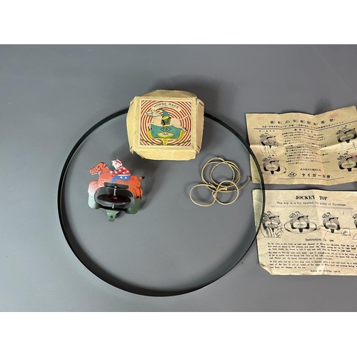 282 - Jockey Top gyroscope tin plate toy, complete in original box. Manufactured during the Occupation of ... 