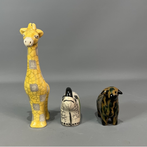 296 - 3 unusual ceramic animal figurines, largest being 22cm. Shipping Group (A).