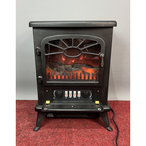 317 - Electric flame effect fire in black factory finish, 52x40x27cm, working order. Collection only or pl... 