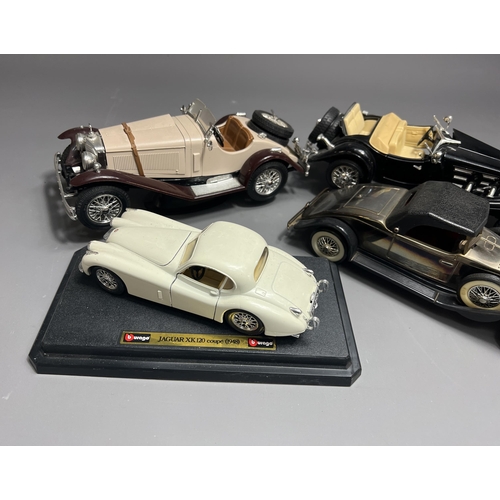 54 - 4 vintage toy model cars including.Burago Mercedes Benz 500 Roadster 1936, scale 1.18, Burago Jaguar... 