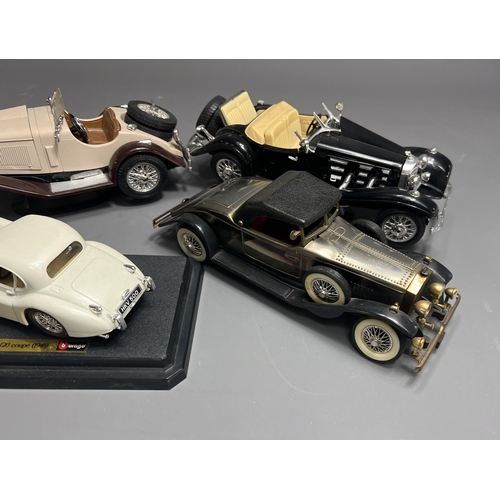 54 - 4 vintage toy model cars including.Burago Mercedes Benz 500 Roadster 1936, scale 1.18, Burago Jaguar... 