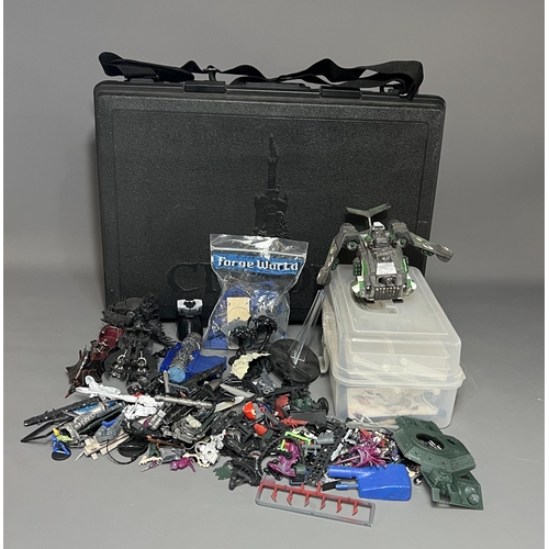 79 - Warhammer carry case with a good quantity of spare/repair figures. Shipping Group (A).