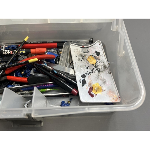 79 - Warhammer carry case with a good quantity of spare/repair figures. Shipping Group (A).