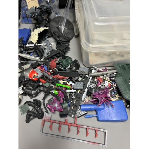 79 - Warhammer carry case with a good quantity of spare/repair figures. Shipping Group (A).