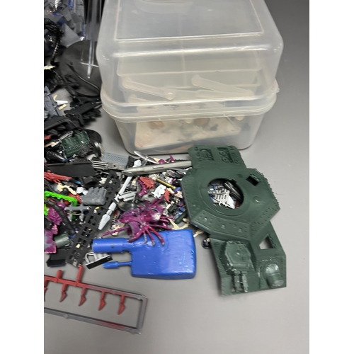 79 - Warhammer carry case with a good quantity of spare/repair figures. Shipping Group (A).