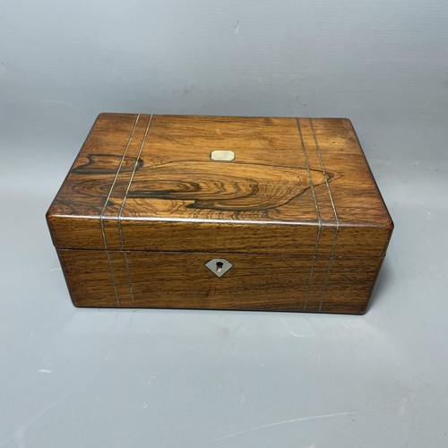 54 - Late c19th wooden vanity case with fitted interior and contents. Measuring 11x28x19cm.  Shipping gro... 