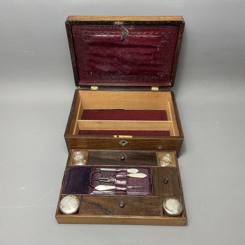 54 - Late c19th wooden vanity case with fitted interior and contents. Measuring 11x28x19cm.  Shipping gro... 