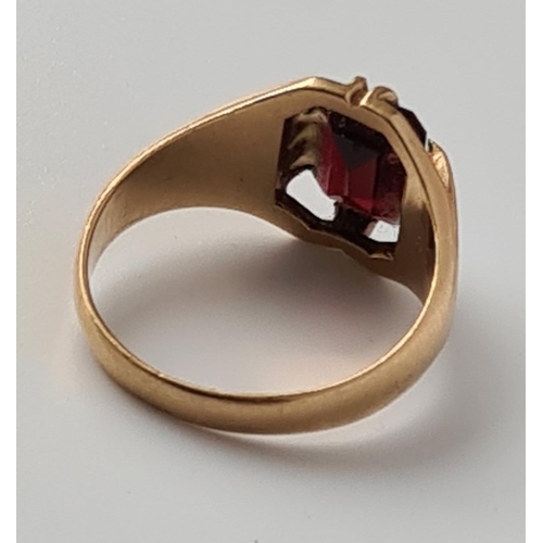 18 - 9ct gold garnet signet ring, 5.3g, finger size T. Shipping group (A), optional combined shipping or ... 