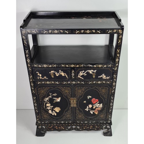 62 - Oriental 2 door cabinet with raised shelf. Decorated with inlaid Mother of Pearl and appliqué carved... 