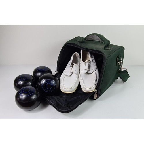 82 - Set of 4 lawn bowls and pair bowling shoes in carry case. Collection in person / your own courier.