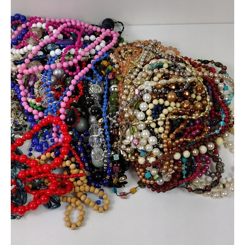 126 - Large quantity of costume jewellery to include beaded necklaces and earrings. Ehipping group (A), op... 