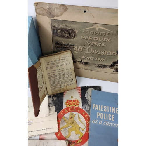 140 - Selection and interesting wartime ephemera to include a soldiers pay book. Shipping group (A), optio... 