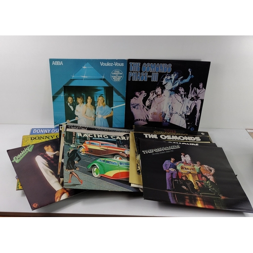 167 - Large assortment of vinyl LP's and 45's to include Abba and many more. Collection in person / your o... 