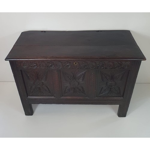 92 - C18th carved oak panel coffer having lift-up lid and internal candle box. Collection in person / you... 