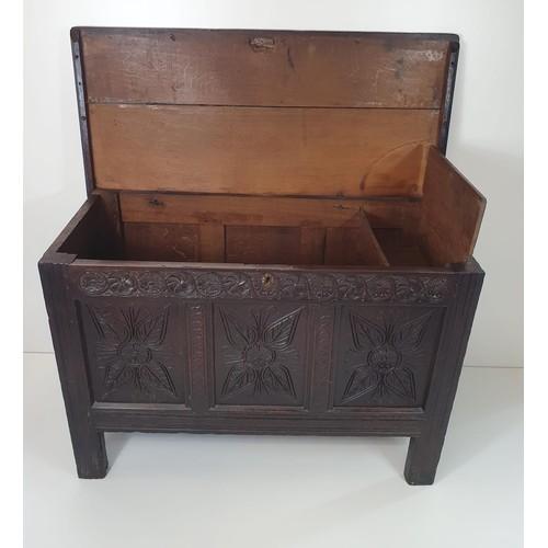 92 - C18th carved oak panel coffer having lift-up lid and internal candle box. Collection in person / you... 