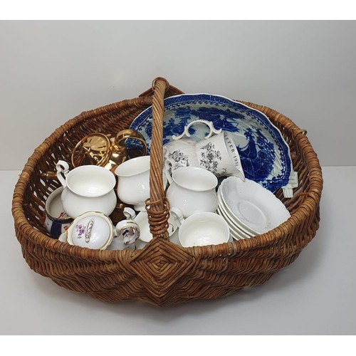 259 - Wicker basket containing assorted chinaware. Collection in person / your own courier.