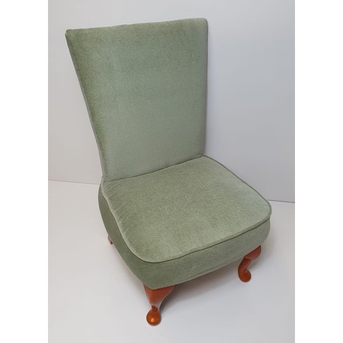 278 - Green upholstered nursing chair. Collection in person / your own courier.