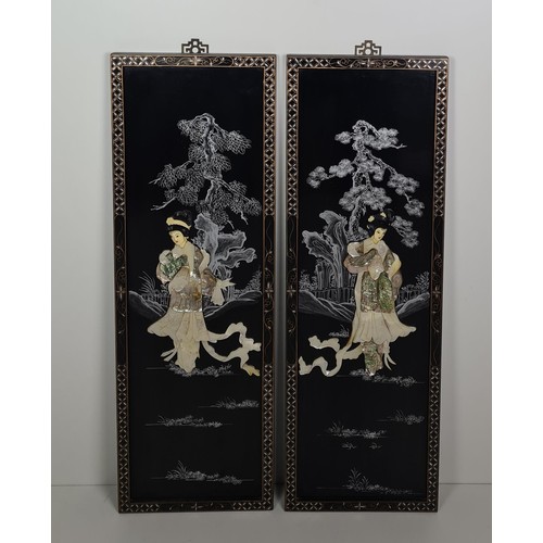 279 - Pair of Oriental wall plagues hand decorated with Mother of Peral and carved bone appliqué.  Measuri... 