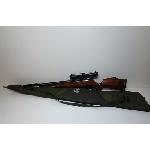 263 - Circa 1950's Falcon .22 PCP air rifle in excellent condition, complete with telescopic sight and car... 