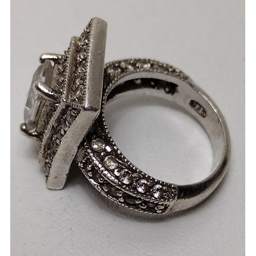 7 - Silver marcasite ring size H½. Shipping Group (A).