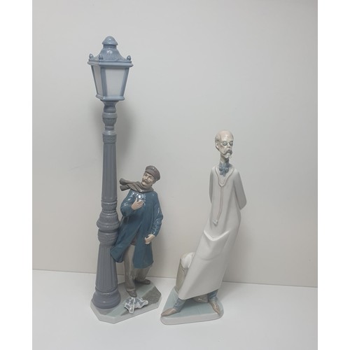 303 - 2 Lladro figures: 4802 'Lamplighter' - Year issued: 1984, Sculptor: Salvador Furio. Standing 48cm an... 