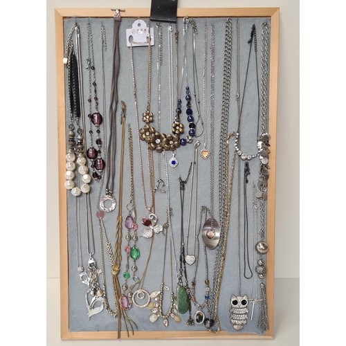 71 - 30 Costume necklaces [display board not included] shipping Group (A).