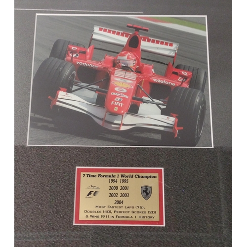 162 - Framed and glazed Michael Schumacher memorabilia, 45x100cm, complete with Certificate of Authenticit... 