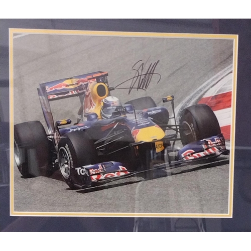 163 - Framed and glazed Sebastian Vettel memorabilia, 71x49cm, complete with Certificate of Authenticity a... 