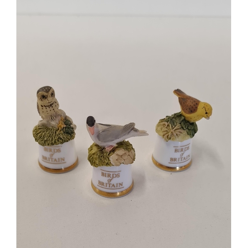 165 - Birds of Britain thimbles in display rack. Collection only.