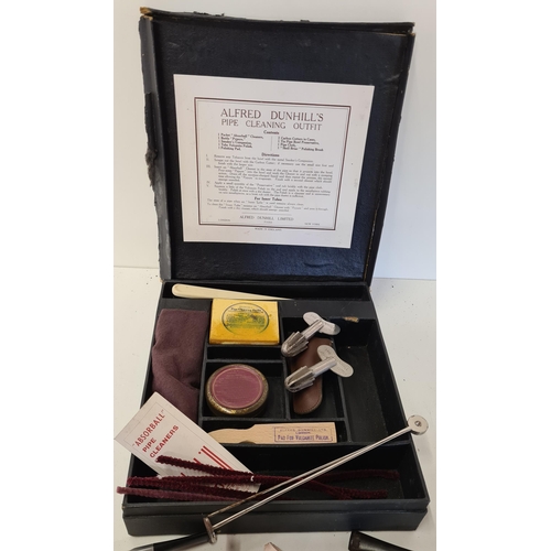 Vintage Dunhill's pipe cleaning kit with assorted smokers pipes