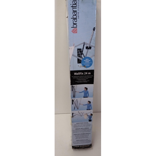 334 - New in box Brabantia wall mounted washing line. Collection only.